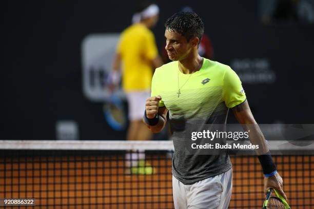 Rogerio Dutra Silva of Brazil celebrates a point against Albert Ramos Vinolas of Spain during the ATP Rio Open 2018 at Jockey Club Brasileiro on...