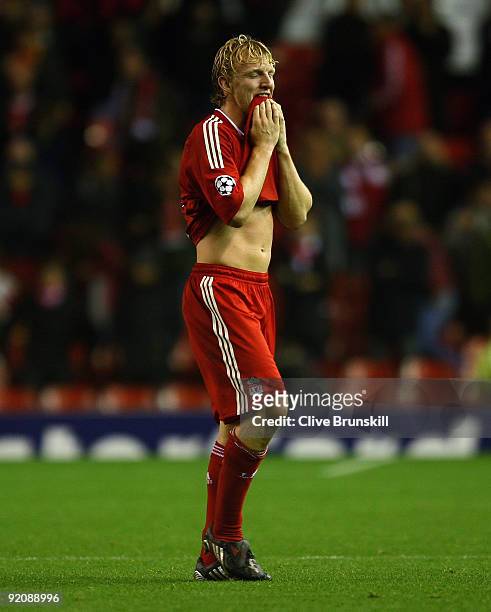 Dirk Kuyt of Liverpool shows his dejection at the final whistle during the UEFA Champions League Group E match between Liverpool and Lyon at Anfield...