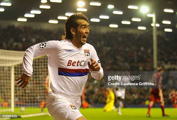 Cesar Delgado of Lyon celebrates scoring the winning goal during the UEFA Champions League Group E match between Liverpool and Lyon at Anfield on...