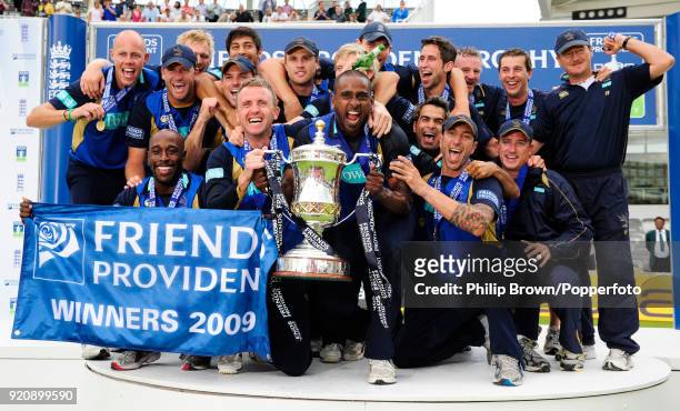 Dominic Cork and team captain Dimitri Mascarenhas hold the Friends Provident Trophy as Hampshire celebrate winning the Friends Provident Trophy Final...