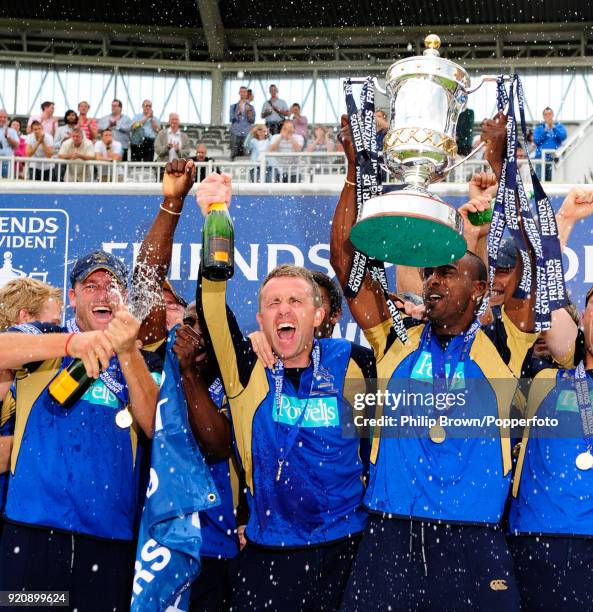 Hampshire captain Dimitri Mascarenhas holds up the Friends Provident Trophy as Hampshire celebrate winning the Friends Provident Trophy Final against...