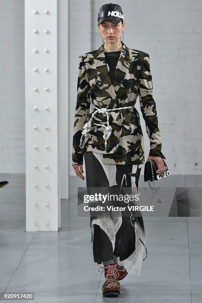 Model walks the runway at the House Of Holland Ready to Wear Fall/Winter 2018-2019 fashion show during London Fashion Week February 2018 on February...