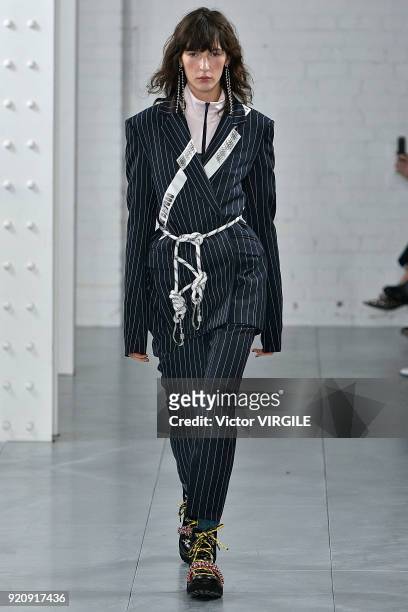 Model walks the runway at the House Of Holland Ready to Wear Fall/Winter 2018-2019 fashion show during London Fashion Week February 2018 on February...