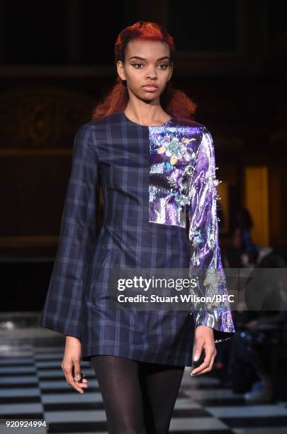 Models walk the runway at the AV Robertson show during London Fashion Week February 2018 at St Andrews Church, Holborn on February 19, 2018 in...