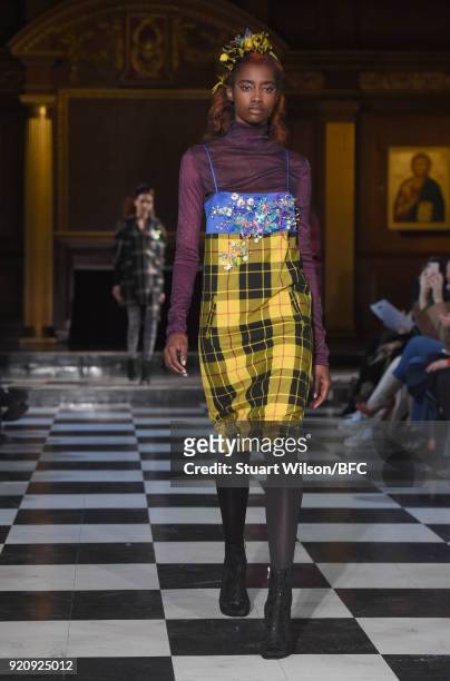Models walk the runway at the AV Robertson show during London Fashion Week February 2018 at St Andrews Church, Holborn on February 19, 2018 in...