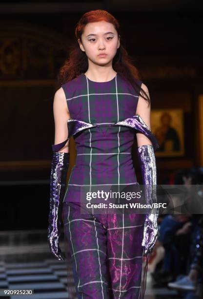 Models walk the runway at the AV Robertson show during London Fashion Week February 2018 at St Andrews Church, Holborn on February 19, 2018 in...