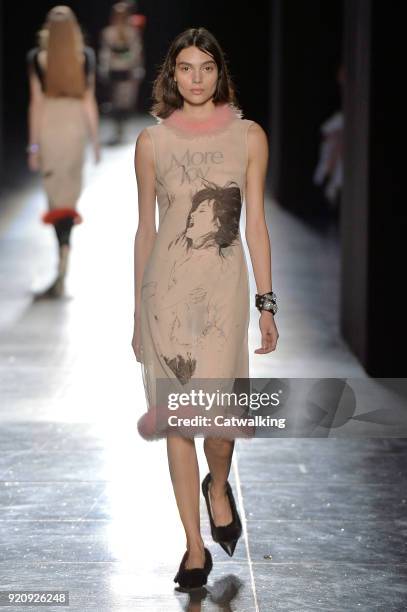 Model walks the runway at the Christopher Kane Autumn Winter 2018 fashion show during London Fashion Week on February 19, 2018 in London, United...