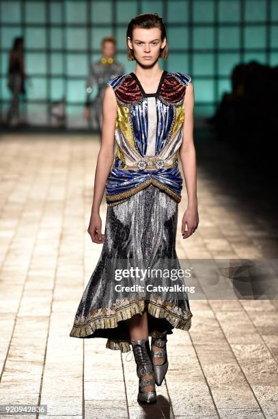 Model walks the runway at the Mary Katrantzou Autumn Winter 2018 fashion show during London Fashion Week on February 18, 2018 in London, United...