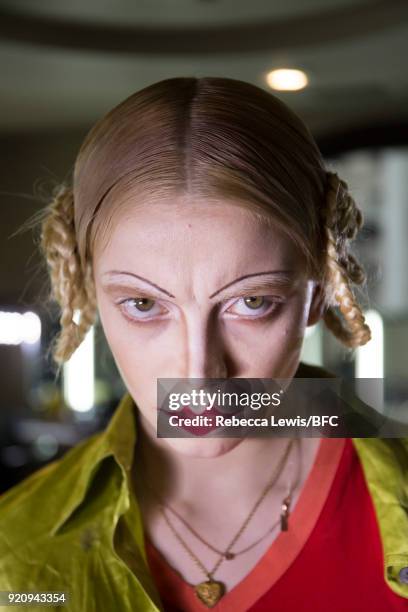 Model backstage ahead of the Dilara Findikoglu Presentation during London Fashion Week February 2018 at St Michael's Church on February 19, 2018 in...