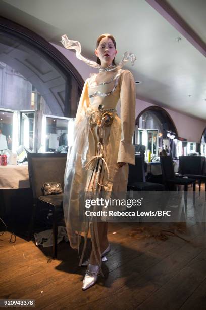 Model backstage ahead of the Dilara Findikoglu Presentation during London Fashion Week February 2018 at St Michael's Church on February 19, 2018 in...