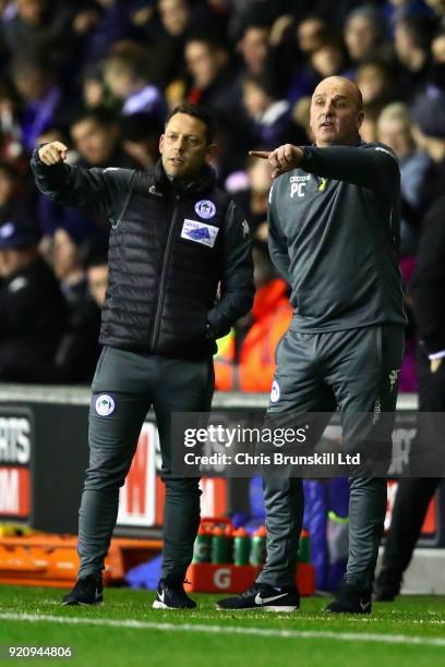 Wigan Athletic manager Paul Cook gestures from the sideline during the Emirates FA Cup Fifth Round match between Wigan Athletic and Manchester City...