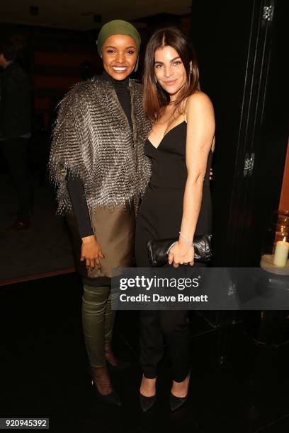 Halima Aden and Julia Restoin Roitfeld attend the Julia Restoin Roitfeld & CR Fashion Book drinks party at Blakes Hotel on February 19, 2018 in...