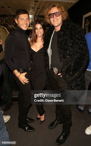 Guest, Julia Restoin Roitfeld and Peter Dundas attends the Julia Restoin Roitfeld & CR Fashion Book drinks party at Blakes Hotel on February 19, 2018...