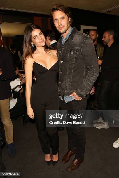 James Rousseau and Julia Restoin Roitfeld attend the Julia Restoin Roitfeld & CR Fashion Book drinks party at Blakes Hotel on February 19, 2018 in...
