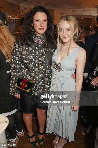Katie Grand and Dakota Fanning attend the LOVE x Miu Miu Women's Tales dinner hosted by Katie Grand and Elle Fanning at Loulou's on February 19, 2018...