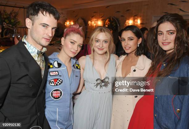 Tom Sturridge, Eve Hewson, Dakota Fanning, Naomi Scott and Millie Brady attend the LOVE x Miu Miu Women's Tales dinner hosted by Katie Grand and Elle...