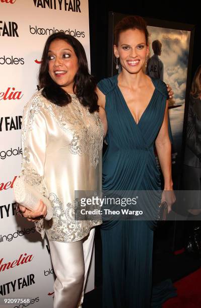 Director Mira Nair and actress Hilary Swank attend the premiere of "Amelia" at The Paris Theatre on October 20, 2009 in New York City.