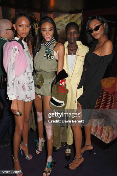 Adesuwa Aighewi, Winnie Harlow, Achok and Jourdan Dunn attends the LOVE and MIU MIU Women's Tales Party at Loulou's on February 19, 2018 in London,...