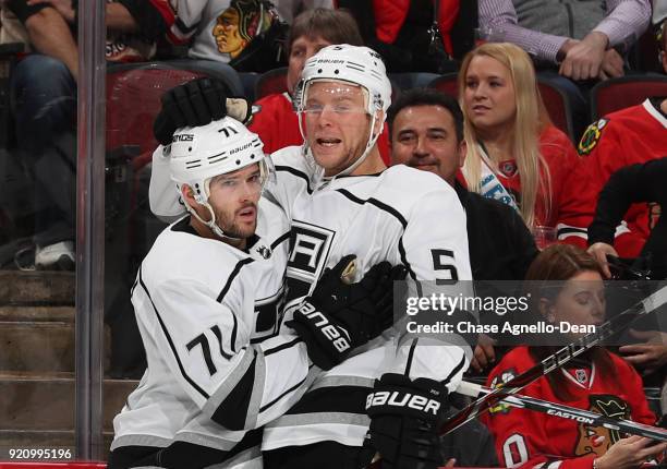 Torrey Mitchell and Christian Folin of the Los Angeles Kings celebrate after Mitchell scored against the Chicago Blackhawks in the first period at...