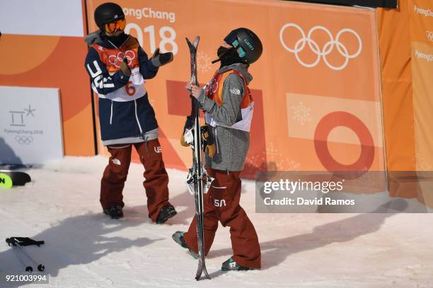 Brita Sigourney of the United States hugs Annalisa Drew of the United States during the Freestyle Skiing Ladies' Ski Halfpipe Final on day eleven of...