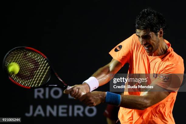 Thomaz Bellucci of Brazil returns a shot to Fabio Fognini of Italy during the ATP Rio Open 2018 at Jockey Club Brasileiro on February 19, 2018 in Rio...