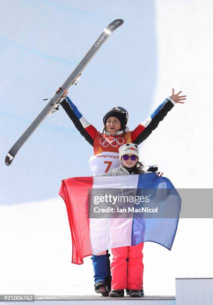 Marie Martinod of France and her daughter Melirose,stand on the podium after the Women's Halfpipe final at Phoenix Snow Park on February 20, 2018 in...