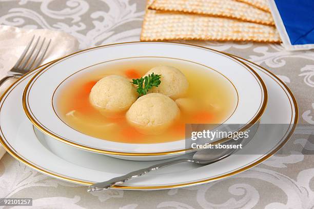 matzah ball soup - matzesuppe stock-fotos und bilder