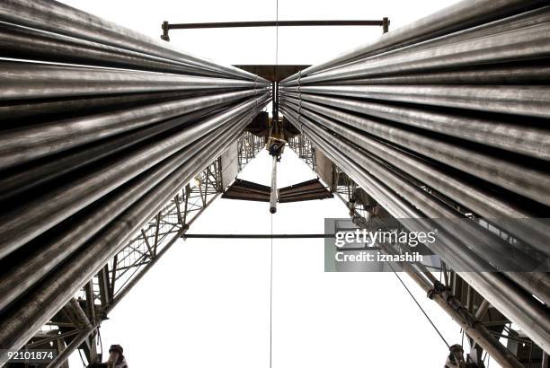 drilling rig with fully loaded drill pipes - construction platform stock pictures, royalty-free photos & images