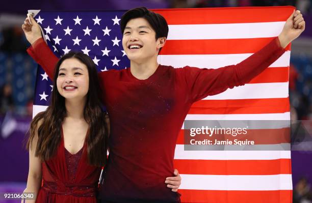 Bronze medal winners Maia Shibutani and Alex Shibutani of the United States celebrate during the victory ceremony for the Figure Skating Ice Dance...