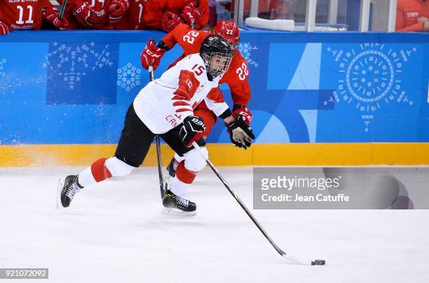 Melodie Daoust of Canada and Maria Batalova of OAR during the women's semifinal ice hockey match between Canada and Olympic Athletes from Russia at...