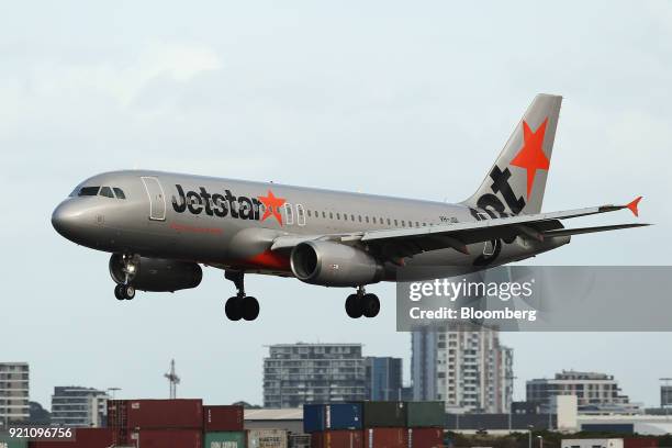 An Airbus SE A320-200 aircraft operated by Jetstar Airways, the low-cost unit of Qantas Airways Ltd., approaches to land at Sydney Airport in Sydney,...