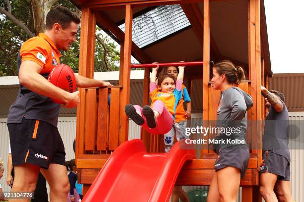 Jeremy Cameron, Nicola Barr and Daniel Lloyd interact with children during a Greater Western Sydney Giants AFL media opportunity to launch their...