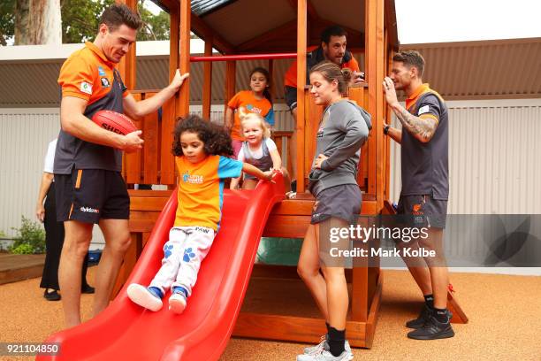Jeremy Cameron, Nicola Barr, Shane Mumford and Daniel Lloyd interact with children during a Greater Western Sydney Giants AFL media opportunity to...