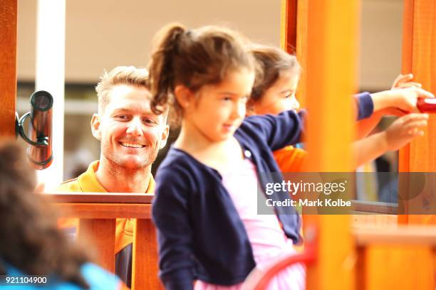 Daniel Lloyd interacts with children during a Greater Western Sydney Giants AFL media opportunity to launch their ÔLittle GIANTSÔ early education...