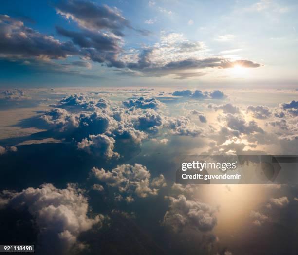 aerial view of clouds from the sky - dramatic sky water stock pictures, royalty-free photos & images