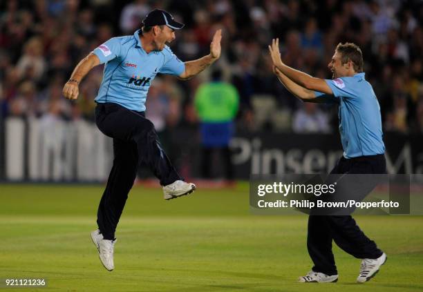 Sussex players Mike Yardy and Luke Wright celebrate a Somerset wicket during the Twenty20 Cup Final between Somerset and Sussex at Edgbaston,...