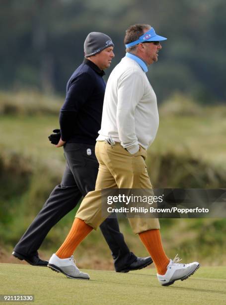 Sir Ian Botham walks with Shane Warne during the first round of the Alfred Dunhill Links Championship at the Old Course, St Andrews, Scotland, 1st...