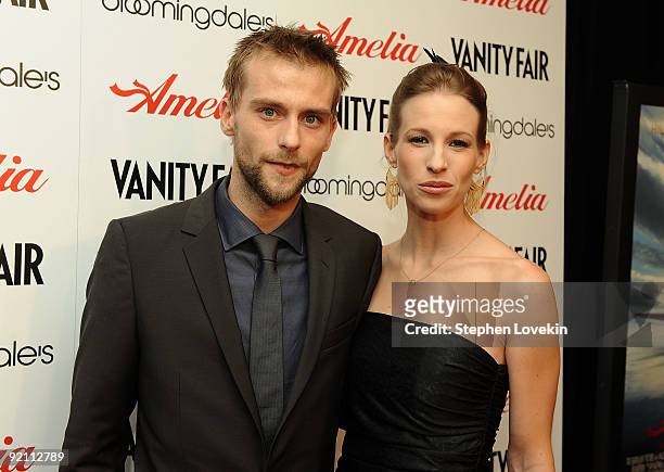 Actor Joe Anderson and Elle Anderson attend the premiere of "Amelia" at The Paris Theatre on October 20, 2009 in New York City.