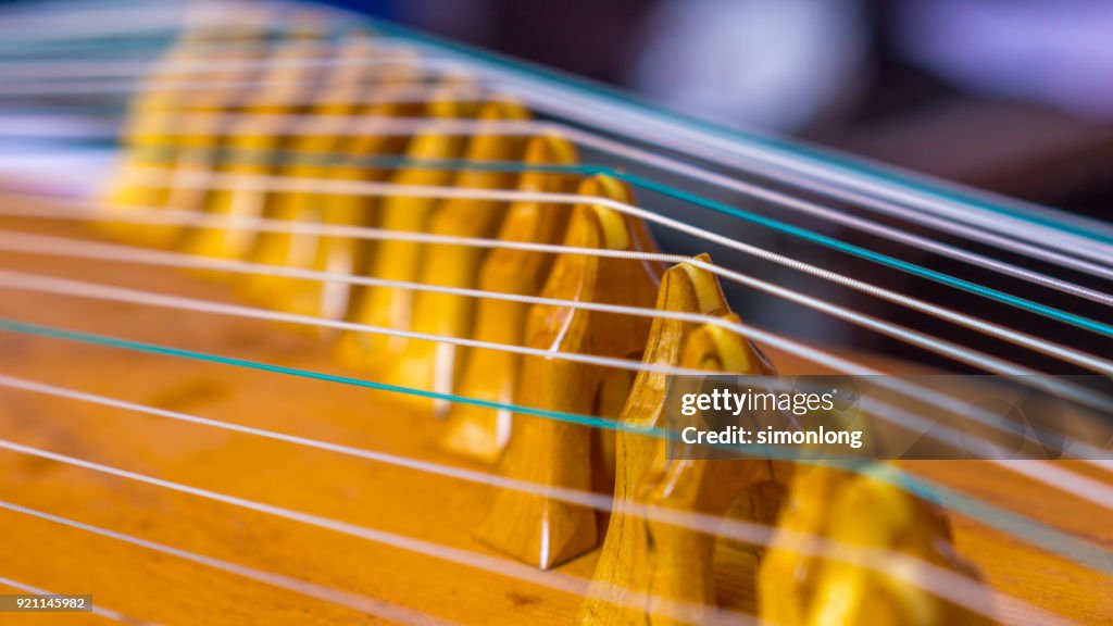 Chinese String Instrument Long Close Up View Of Chinese Musical Instrument String High-Res Stock Photo ...