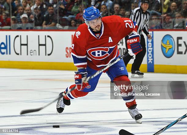 Right wing Brian Gionta of the Montreal Canadiens takes a shot during the NHL game against the Atlanta Thrashers on October 20, 2009 at the Bell...