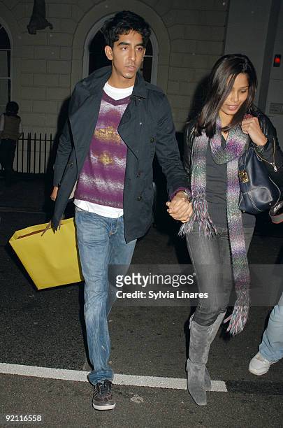 Dev Patel and Frieda Pinto arriving at Liberty shop on October 20, 2009 in London, England.