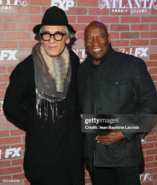 Alon Abutbul and John Singleton attend the FX's 'Atlanta Robbin' Season' Premiere on February 19, 2018 in Los Angeles, California.