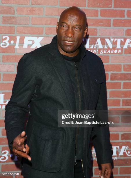 John Singleton attends the FX's 'Atlanta Robbin' Season' Premiere on February 19, 2018 in Los Angeles, California.