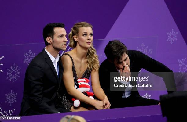 Madison Hubell and Zachary Donohue of USA with their coach Romain Hagenauer react with disappointment at 'kiss and cry' during the Figure Skating Ice...