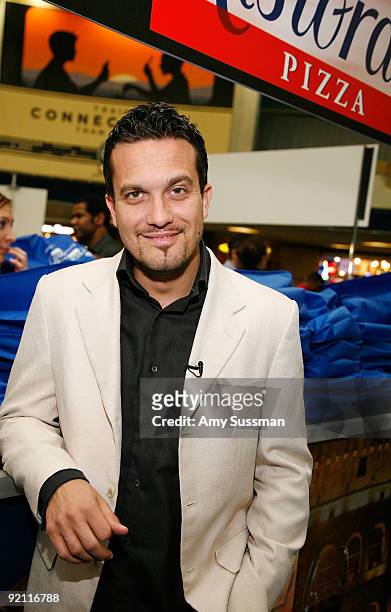 Top Chef's Fabio Viviani gives away Dr. Oetker Ristorante pizza at Penn Station on October 20, 2009 in New York City.