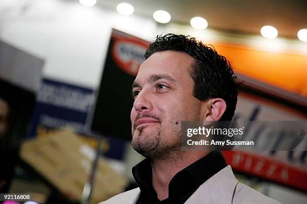 Top Chef's Fabio Viviani gives away Dr. Oetker Ristorante pizza at Penn Station on October 20, 2009 in New York City.