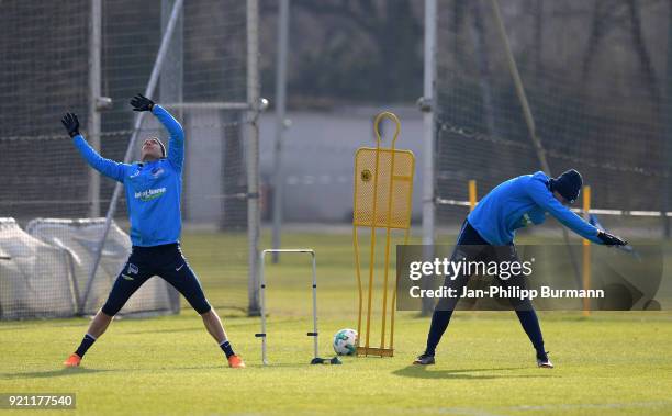 Per Skjelbred and Niklas Stark of Hertha BSC stretch during the training at the Schenkendorfplatz on february 19, 2018 in Berlin, Germany.