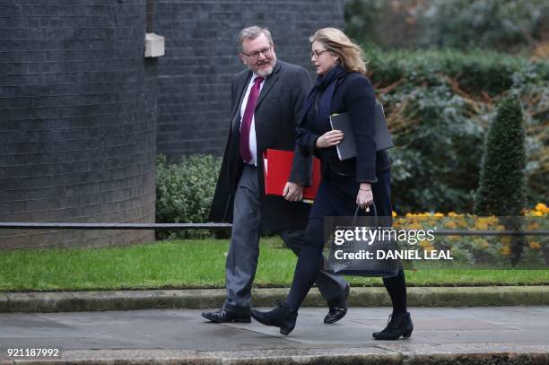 Britain's Scotland Secretary David Mundell and Britain's International Development Secretary Penny Mordaunt arrive in Downing street for the weekly...