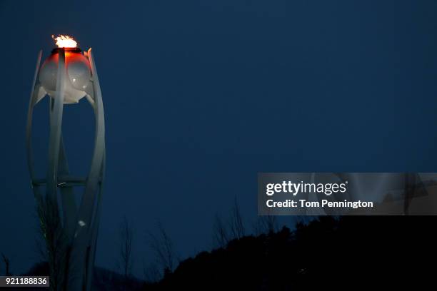 The Olympic flame burns at Olympic Park on day 11 of the PyeongChang 2018 Winter Olympic Games on February 20, 2018 in Pyeongchang-gun, South Korea.