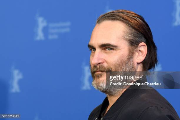 Joaquin Phoenix poses at the 'Don't Worry, He Won't Get Far on Foot' photo call during the 68th Berlinale International Film Festival Berlin at Grand...